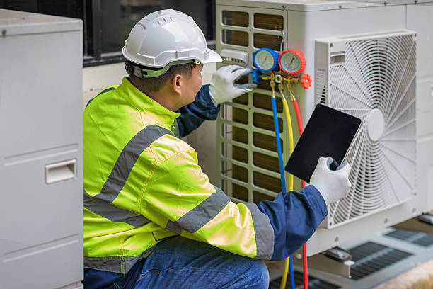 Professional Hvac technician working in Armington, IL